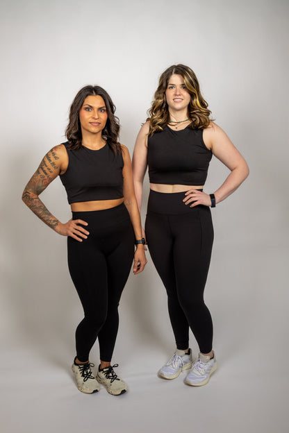 Two women wearing WRAX Apex high-impact sports bras built for running, wrestling, Brazilian Jiu-Jitsu, and all-day athletic performance.