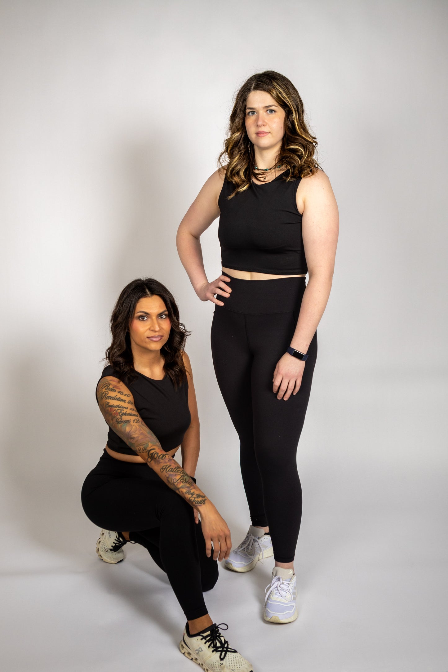 Athletes wearing the WRAX Apex sports bra for maximum support during boxing, Brazilian Jiu-Jitsu, wrestling, and high-impact training.