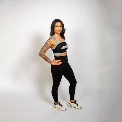 Athlete demonstrating the WRAX Rebel patented bounce control system for women seeking better support during high-impact movement.